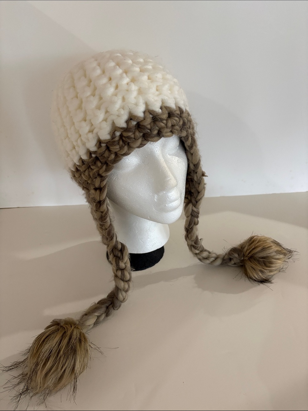 MERONA EAR FLAP BEANIE WITH BRAIDED SIDE TASSELS AND POM POMS